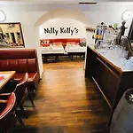 Отель Nelly Kellys 4*