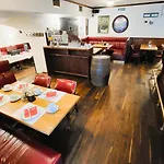 Отель Nelly Kellys 4*